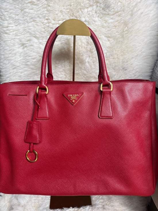 Prada Handbags - Prada Red Saffiano Tote with Gold Hardware Amazing condition! Authentic